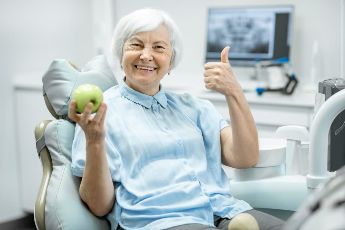 Featured image for Why Does a Root-Treated Tooth Sometimes Turn a Dark Grey or Purple Shade Over Time?